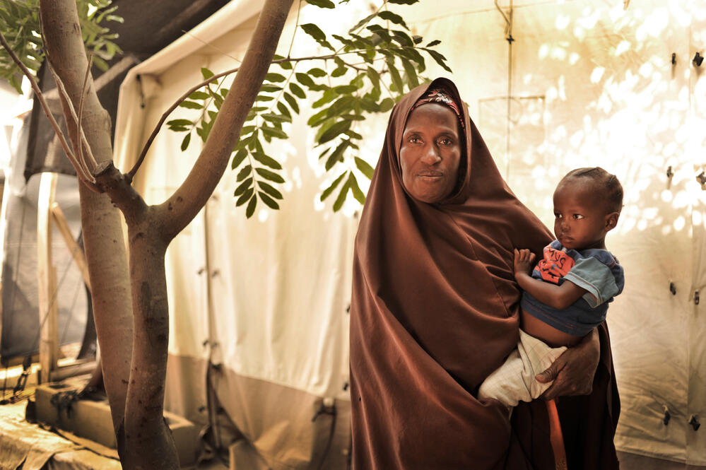 Aisha Abdullahi with her granddaughter, Maimuna, who is being treated for malnutrition.
