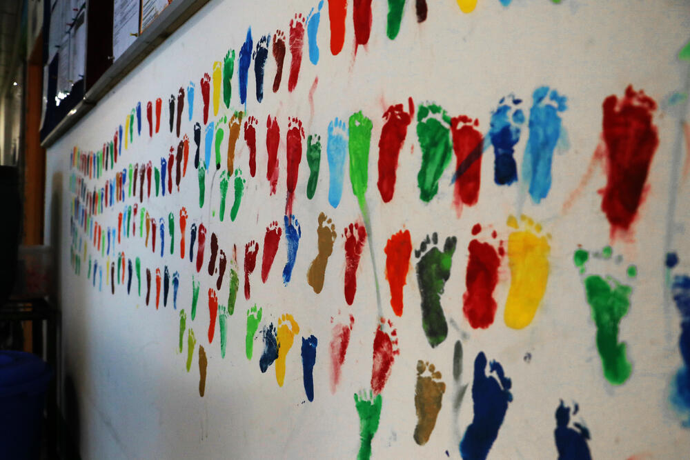Colourful footprints on a wall in the MSF Goyalmara Mother and Child hospital in Cox’s Bazar, Bangladesh