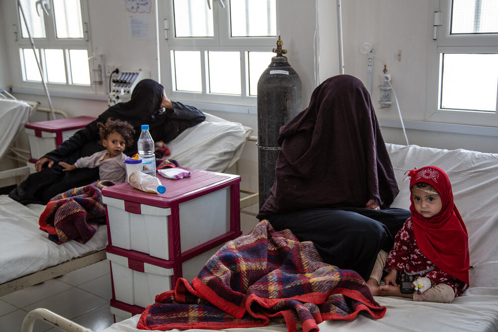 Mothers waiting with their children on the paediatric ward in Haydan Hospital