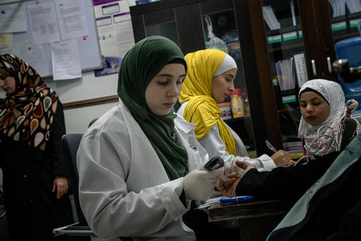 Nurses Feda' Abu Rashed (Left) and Ala' Al-Share' (Right) Nurses Feda' Abu Rashed (Left) and Ala' Al-Share' (Right)