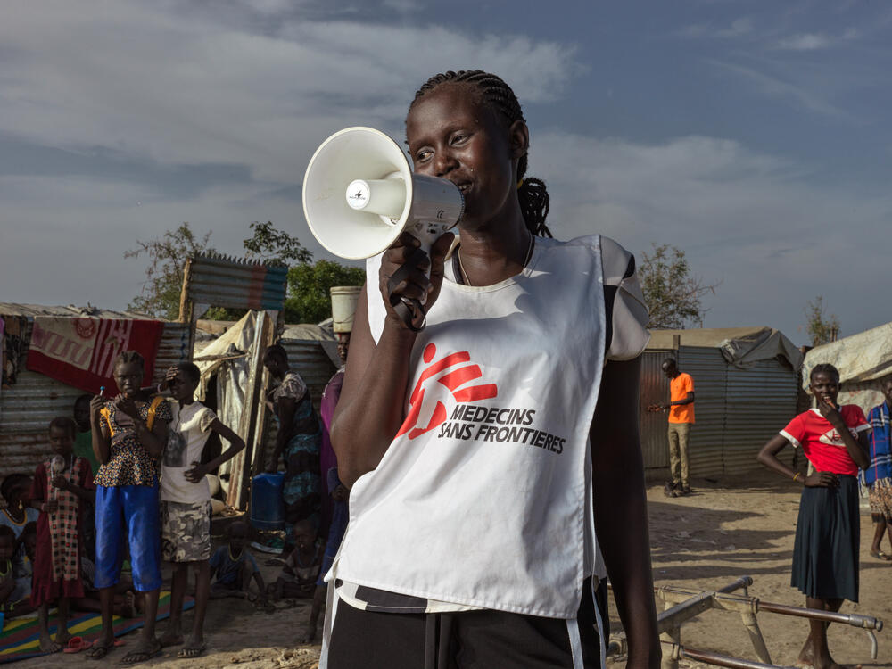 An MSF health promoter helping to mobilise the community in Bentiu to get vaccinated