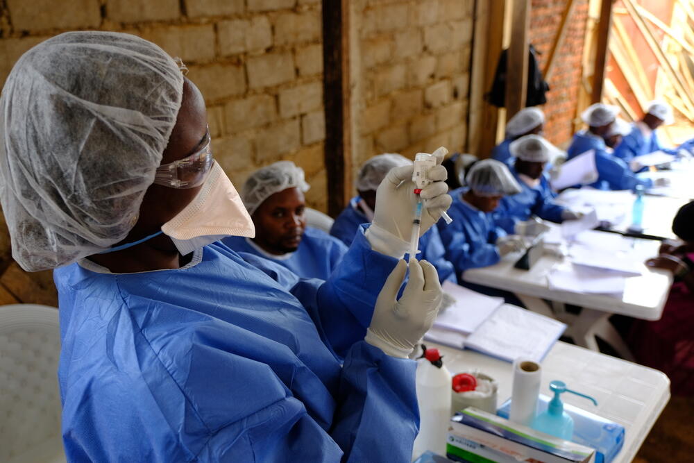 A vaccination team at Kanzulinzuli health centre in Beni.
