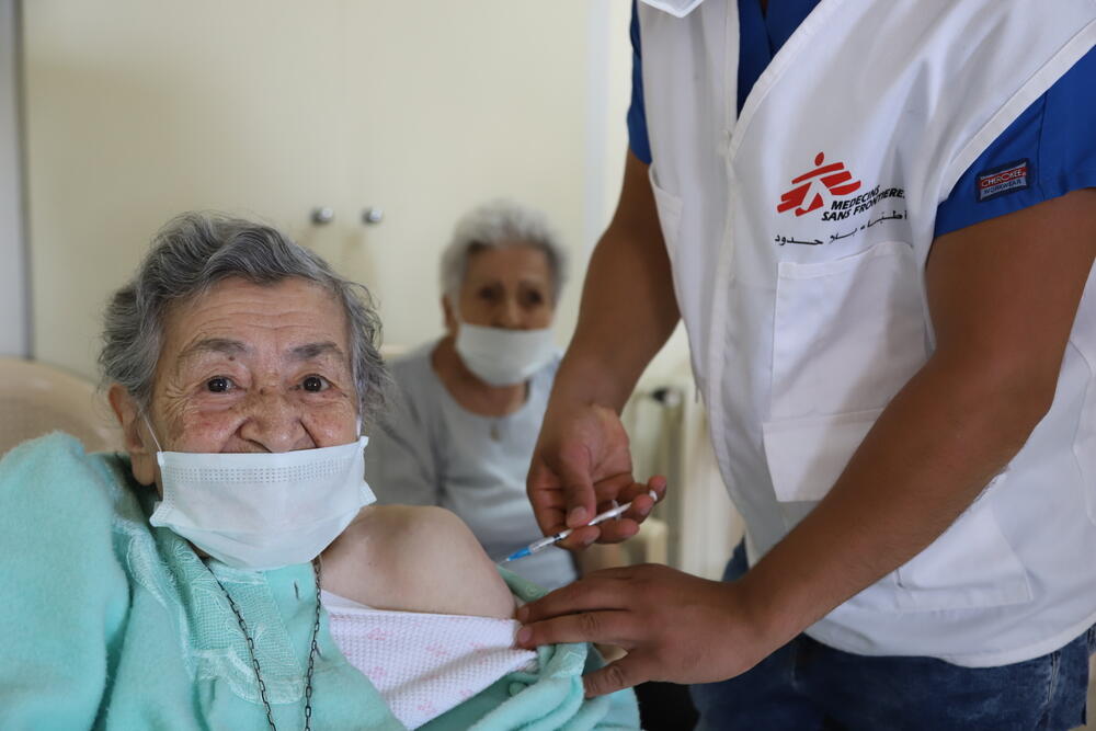 An elderly woman is being vaccinated against COVID-19 by a member of MSF’s mobile vaccination team at a nursing home in Shayle (Mount Lebanon).