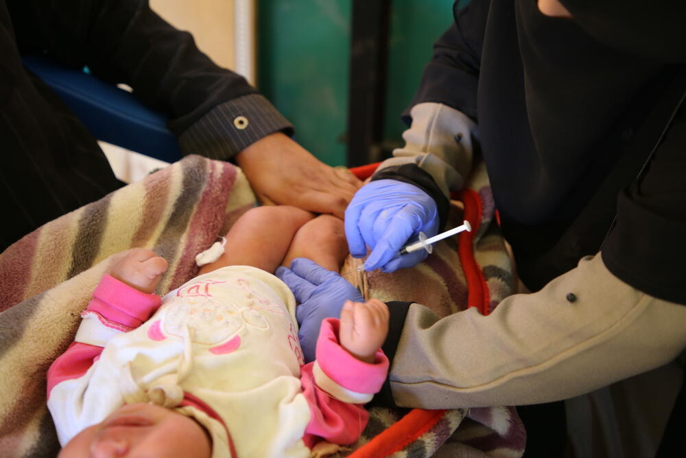 A nurse providing vital vaccinations to children being treated at the MSF hospital in Marib