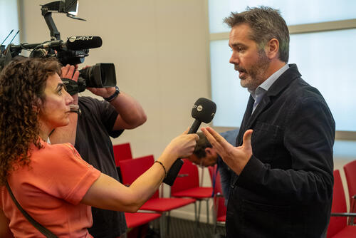 Chris Lockyear speaking to a journalist at the Gaza press conference, Brussels, June 2025 Chris Lockyear speaking to a journalist at the Gaza press conference, Brussels, June 2025