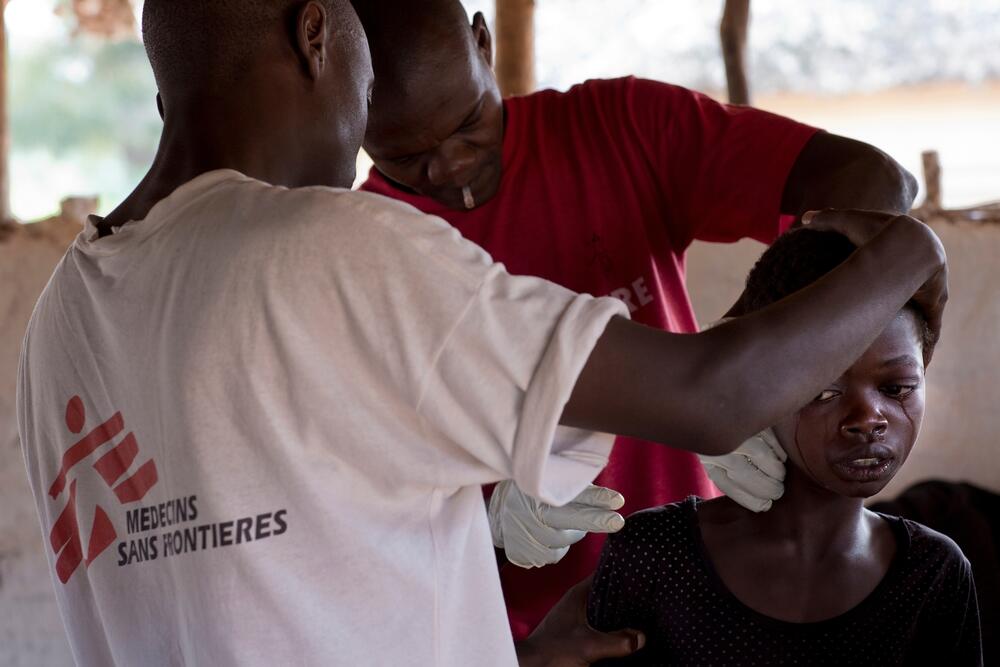 MSF mobile clinic staff run tests to diagnose sleeping sickness in the village of Emmaus, northeast DRC.