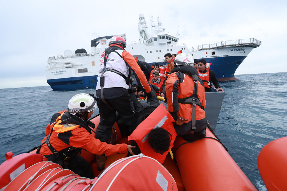 An MSF search and rescue team help 48 people, including children, from a wooden boat in distress found in the Central Mediterranean (February 2023)