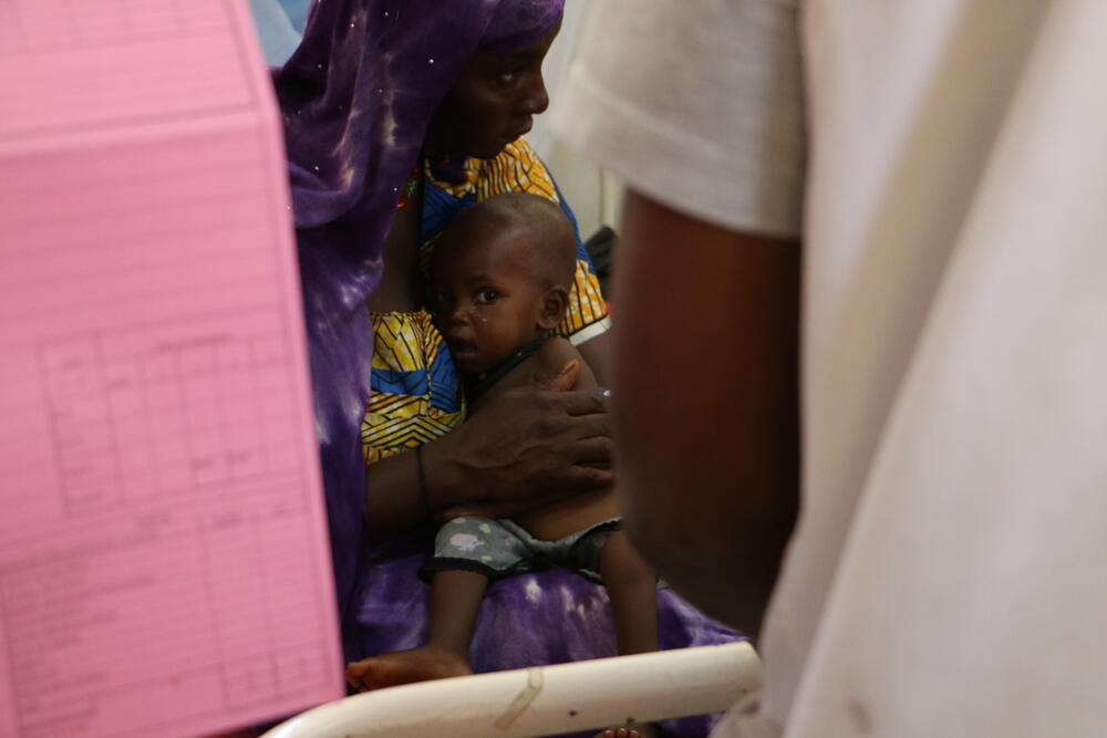 A child affected by severe malnutrition is treated in the CNT.