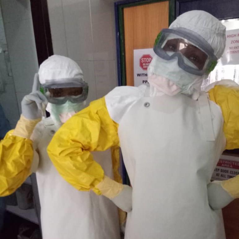 Shirley and one of her teammates wearing PPE at the project in Ebonyi