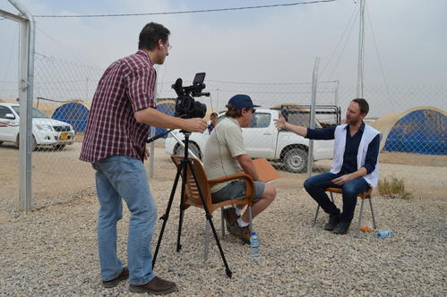 Film crew interviewing Dr. Gregory Keane, the Regional Mental Health Referent for MSF in the Middle East, who speaks to them about the mental health needs of the communities displaced by fighting in Mosul.