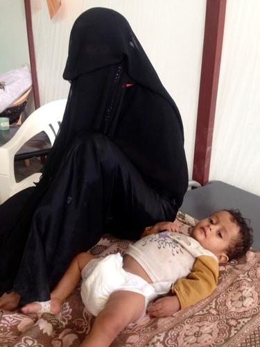 Fatima and her son. Kilo, southern Ibb governorate Fatima and her son. Kilo, southern Ibb governorate