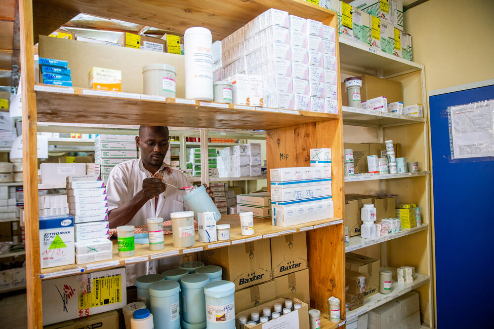 In Burundi, a nurse collects medicines from a pharmacy inside an MSF Trauma Centre In Burundi, a nurse collects medicines from a pharmacy inside an MSF Trauma Centre