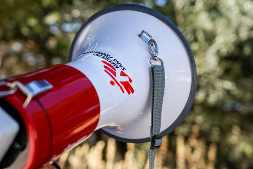 Close-up of an MSF speakerphone during an emergency medical aid response in Samos island, Greece. MSF has been responding to requests for emergency medical assistance to people arriving by boat on the island of Samos since August 2021. MSF’s emergency response has shown the high medical and humanitarian needs amongst new arrivals. During our interventions, most people we assist are exhausted and severely distressed. A lot of them are dehydrated after spending a long time, sometimes several days, in the bush without access to food and water.