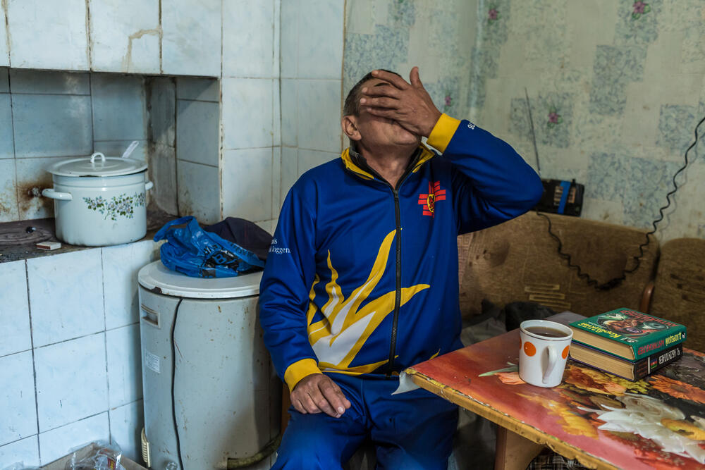 MSF patient Vitalii Gorbachov takes his TB medication at his home in Zhytomyr, Ukraine
