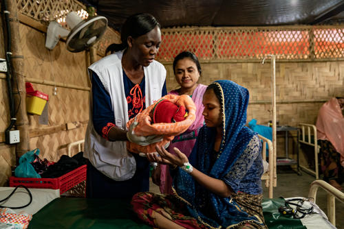 Christine Akoth is a Kenyan midwife, and she leads the maternity services in MSF primary health centres in Jamtoli and Hakimpara, Cox’s Bazar, Bangladesh.  

The Rohingya women prefer to give birth in their homes. Traditional practices in the community, lack of trust in healthcare providers, combined with exclusion from healthcare in Myanmar contribute to deliveries at home. MSF health promotion teams work with traditional birth attendants, and community and religious leaders to encourage expectant mothers to give birth in health facilities where they can be assisted by medical professionals. MSF in Cox’s Bazar assists deliveries, and provides antenatal and postnatal care, family planning services, menstrual regulation (Bangladesh term for safe abortion care), mental health care, and medical and psychosocial support for survivors of sexual violence.