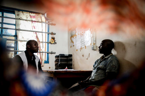Counsellor Floribert Nzaituriki Nabonibo, conducts a psychosocial consultation with psychiatric patient Fabien Banjanga, at Mweso General Hospital on the border between the Masisi and Rutshuru territories in North Kivu, Democratic Republic of the Congo.