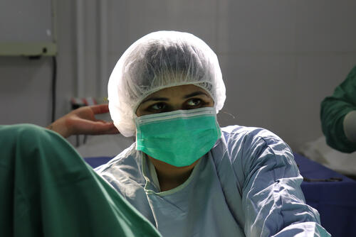 Gynaecologist operating a woman in the Operations Theatre of Boost hospital, Lashkar Gah .