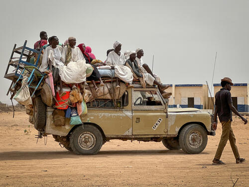 Displaced people fleeing violence in Tawila, Sudan, in June 2024