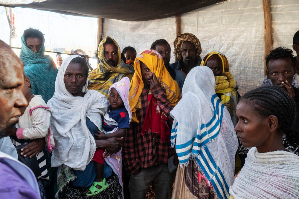 Tigrayan refugees, who fled the military offensive in north Ethiopia, waiting outside an MSF clinic at a transit camp in Sudan