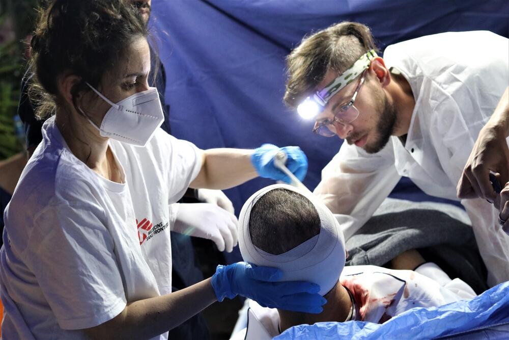 MSF staff working with the Palestinian Red Crescent Society to stabilise injured Palestinians in Jerusalem