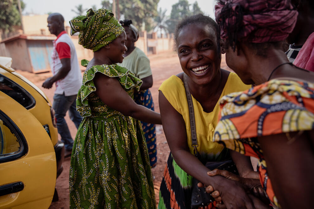 Claire, France's sister, smiles as she says goodbye to other MSF patients' families at MSF’s SICA Hospital