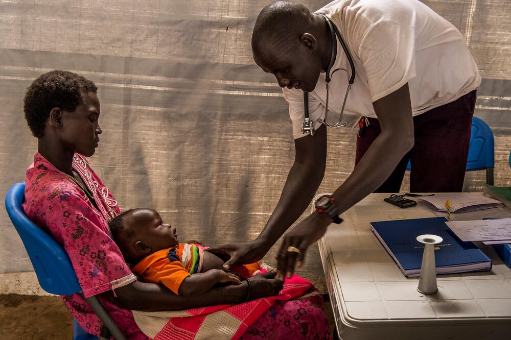 An MSF nurse treats a six-month-old boy suffering from pneumonia in Meer, South Sudan