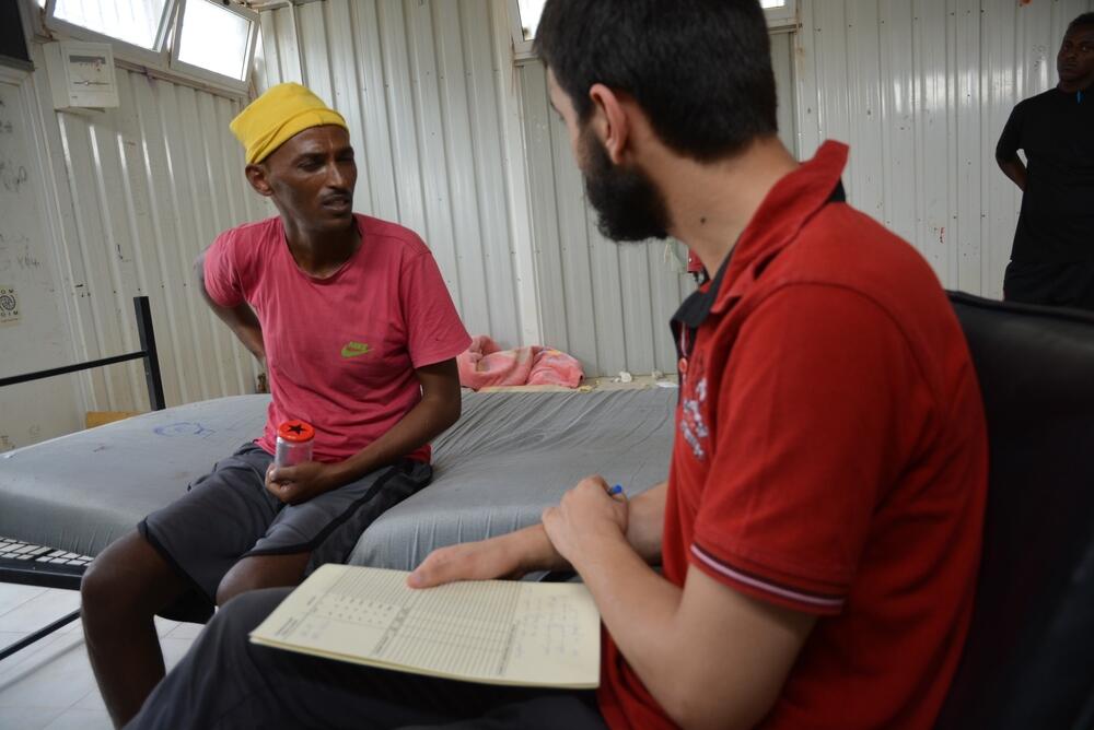 John back in 2019, during a medical consultation with an MSF doctor at Gharyan al-Hamra detention centre