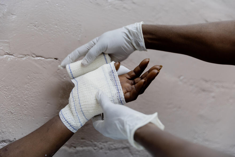 MSF staff change France’s wound dressing on 25 January 2021 at SICA Hospital