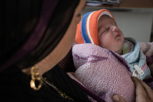 Mohammad, nine days old, with his mother Seva Mohammad, nine days old, with his mother Seva