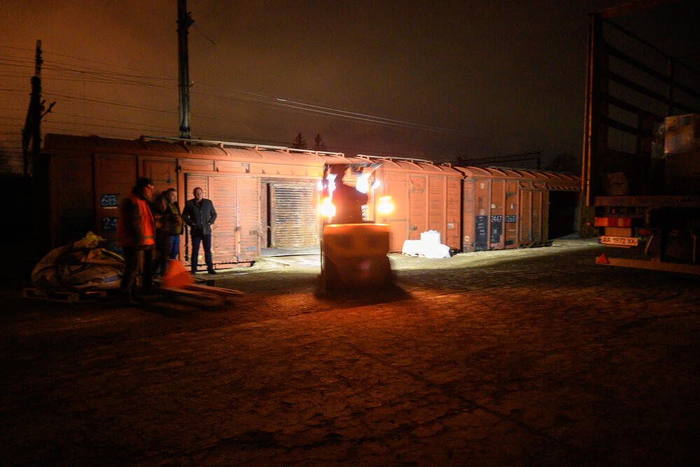 Late-night loading of MSF emergency medical supplies onto a train at Lviv station, to be dispatched as rapidly as possible to hospitals in Kyiv, 5 March 2022. 
