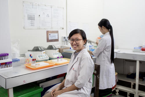 Su Mon Thein, 27, is the head lab technician at Insein clinic. She is in charge of overseeing lab tests and results, stock inventory, and supervising a team of technicians. Her favourite part of the job is working closely with her team, getting to know what inspires them and motivating each other to accomplish their work. When asked, "What does being a woman mean to you?" She said, "I'm very proud to be a woman! In our culture, women have to work all day and then we come home and take care of work in the household too. But it shows, we are strong and can handle more tasks than men."