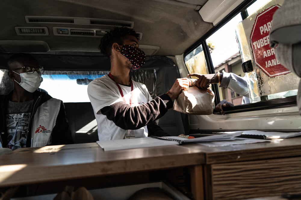 MSF peer worker, Carlos, hands out safe injection kits to drug users in Maputo, Mozambique, 2021.