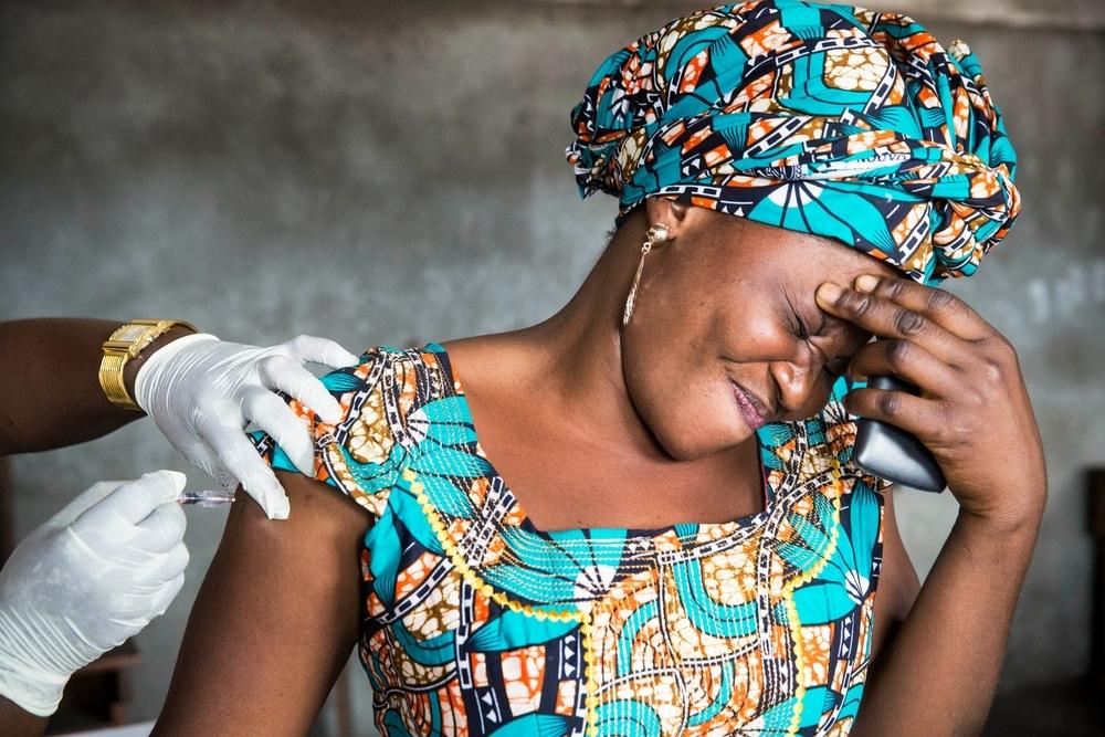 A woman receives a vaccination against yellow fever in Kinshasa, DRC. 