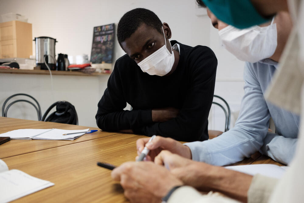 Yannick taking part in French classes at MSF's Passerelle project
