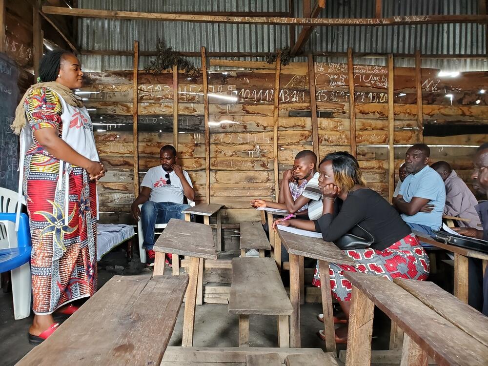 MSF COVID-19 health promotion training and information sessions with a group of volunteer community healthcare workers in the village of Kiziba, in North Kivu province, DRC.