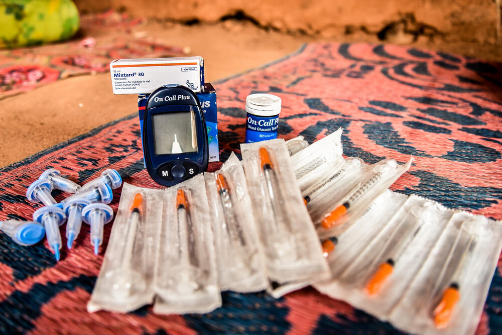 Some of the medical tools required to manage diabetes - including insulin, syringes and a glucose monitor - belonging to an MSF patient in Kenya