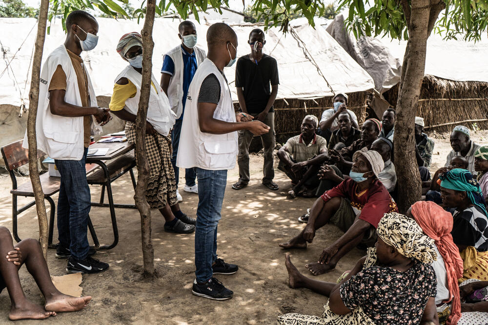 A mental health session is conducted with people who have sought shelter in the Nangua camp. These sessions are used to help those displaced by the conflict talk about their experiences and get support for issues like PTSD.