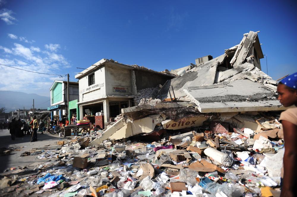 Collapsed building and rubble in Port-au-Prince city centre, shortly after the earthquake in 2010.