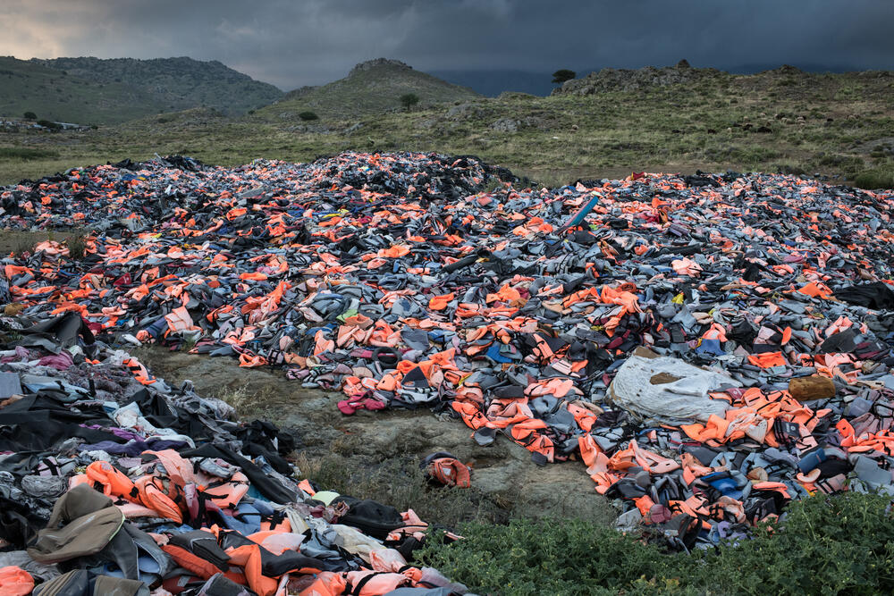 Thousands of life jackets left behind by migrants arriving on Lesbos Island, Greece