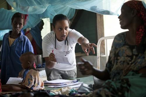 MSF Doctor Luana Lima seeing patients at the MSF hospital in  Dadaab refugee camp in northern Kenya. July 22 2011. Photo Brendan Bannon.