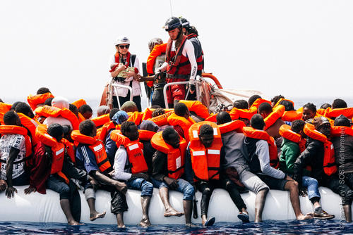 Rubber boat is waiting for a rescue Rubber boat is waiting for a rescue