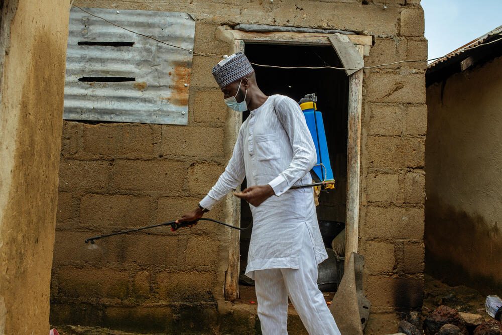 An MSF health promoter disinfects local people’s houses