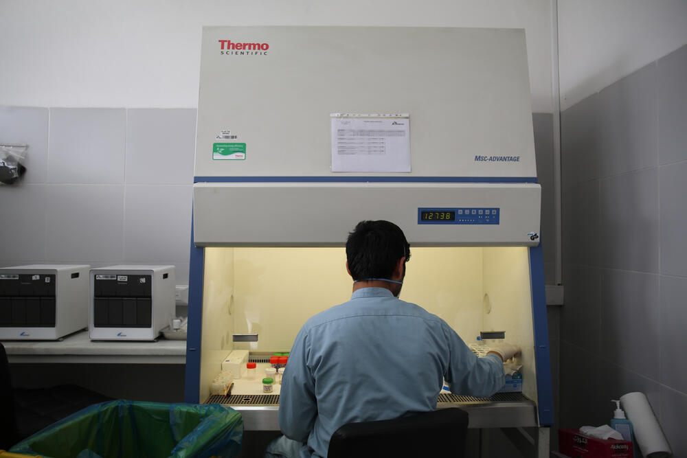 An MSF lab technician tests samples of drug-resistant TB at a hospital in Kandahar, Afghanistan