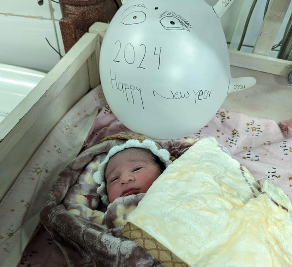 Baby Zubir, born in Afghanistan just two minutes after midnight