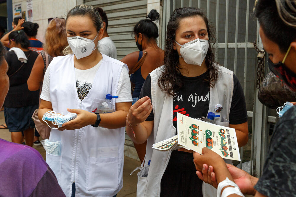 An MSF health promotion team distributes masks, advice and guidance on ways to avoid coronavirus, in Tefé, Brazil.