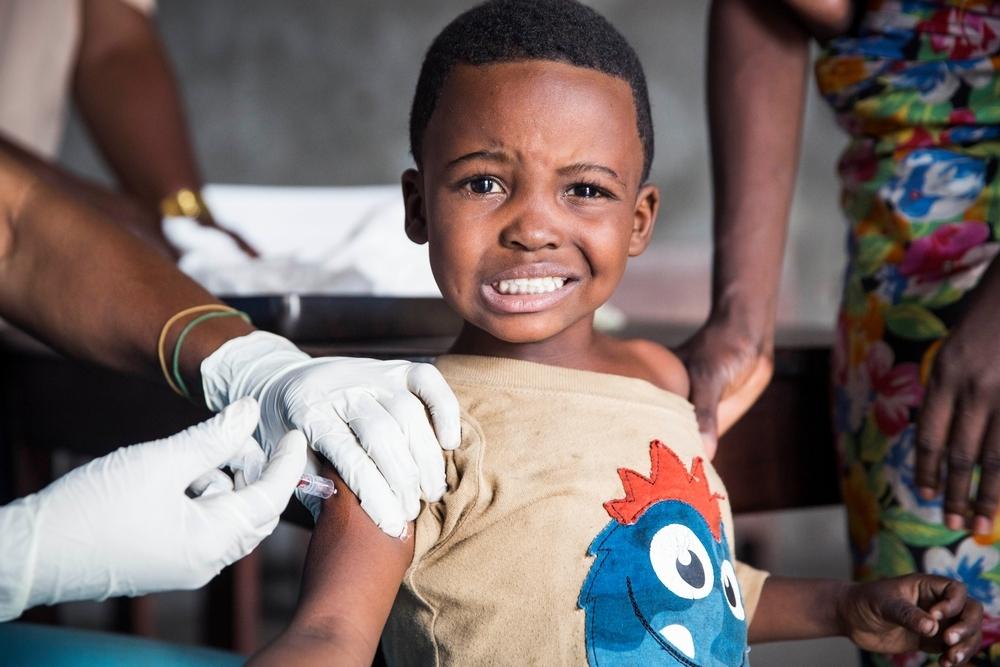 A boy receives a vaccination against yellow fever in Kinshasa, DRC. 