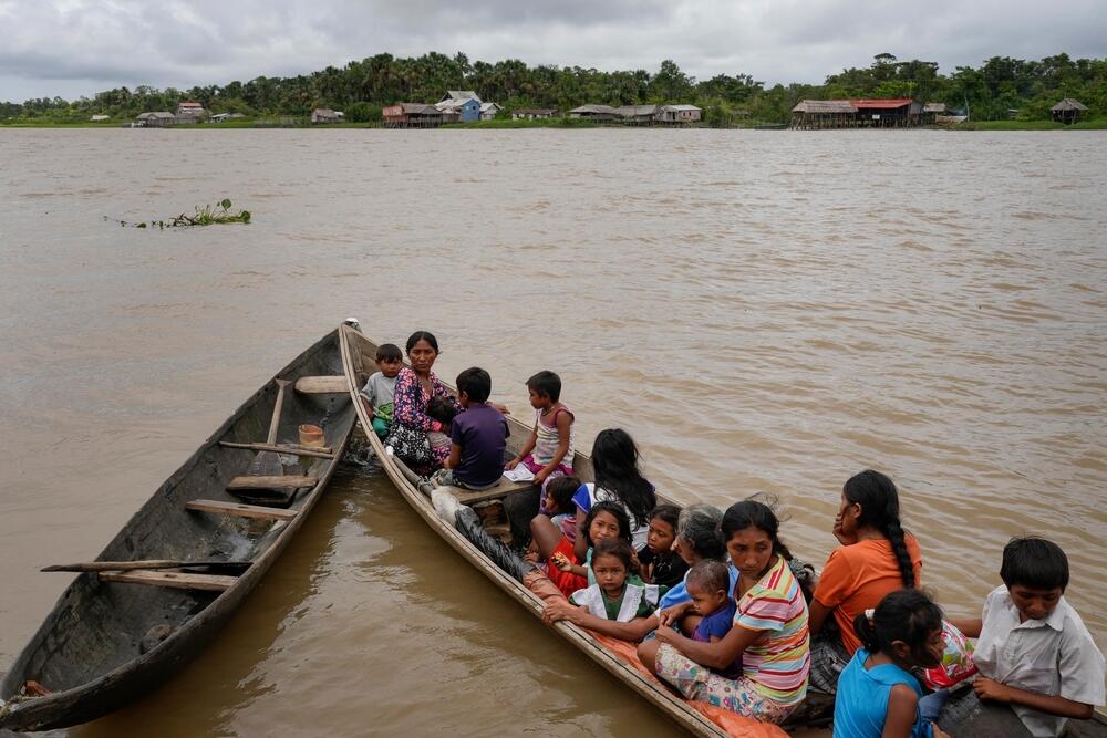 Parents have to paddle by canoe for hours and sometimes days to reach healthcare in Delta Amacuro