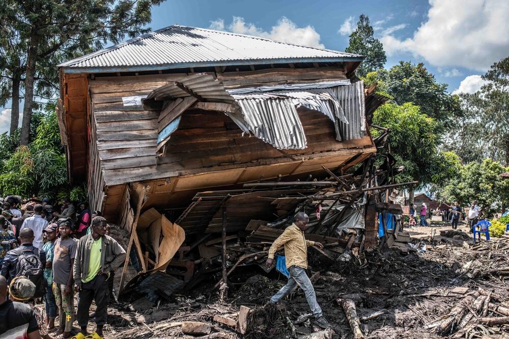 A house is completely overturned by the floods in Nyamukubi village, Kalehe