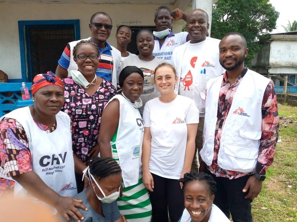 Marilen and some of the team outside the healthcare centre in Monrovia