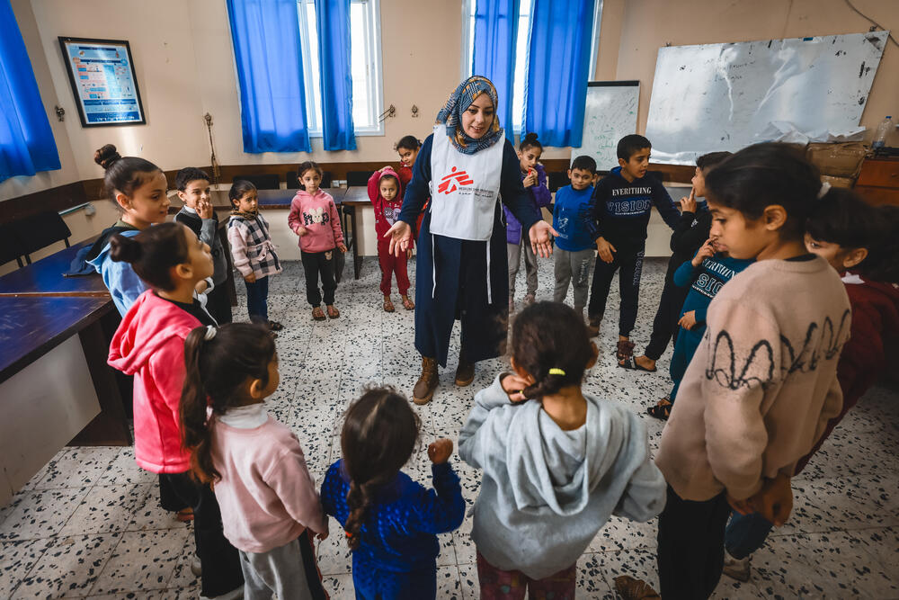 "My name is Marwa Abu Al Nour, and I’m a psychologist with MSF. I’ve been working with them for 3 years. We are now in Martyrs clinic. We are providing mental health support to all people who are here, especially the internally displaced. I have a group of displaced children from either the North or from Khan Yunis.
As a psychologist, the most common things I see among children are nightmares, bed-wetting, anxiety, fear. We try as much as possible to give them support via recreational activities.
After that, we will work with the mothers through psychoeducation to explain to them what might happen to them because of the situation and how can they deal with it.
MSF’s role is to provide the support to the clinic, and in particular to the children and mothers who are at the clinic or in the school next door."